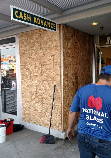 A car drove through this storefront in Arleta requiring a board-up and storefront replacement.