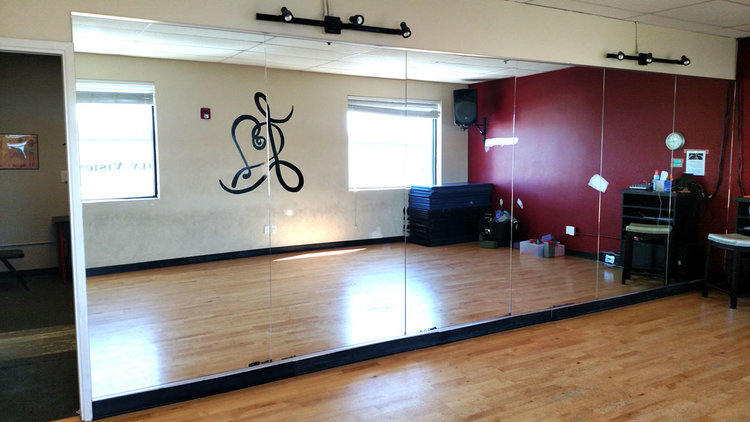 A new bank of mirrors right after installation at a local dance studio/gym, Valencia, CA.